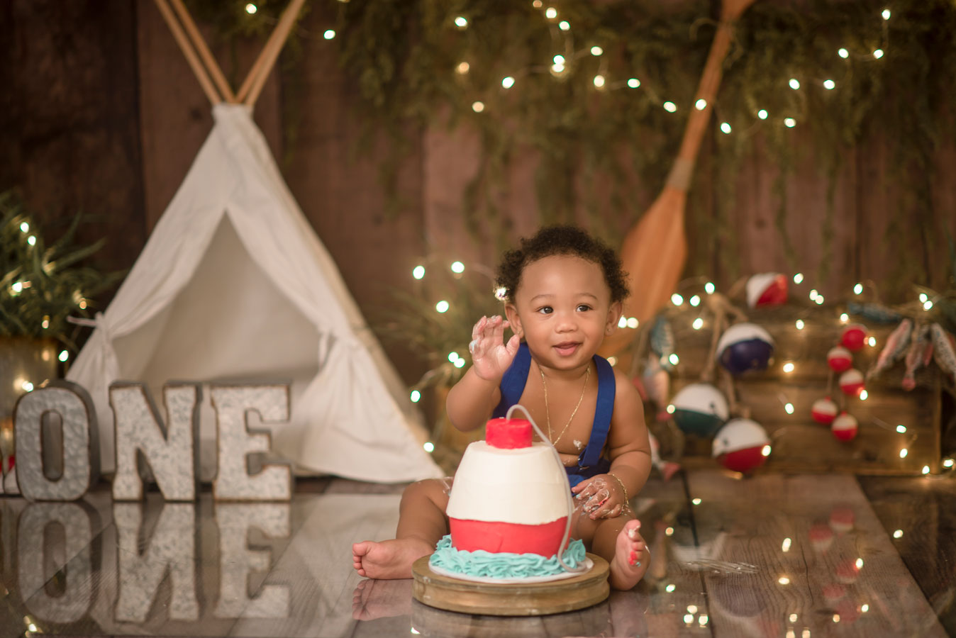 Gone fishing first birthday cake smash ofishally one boy cake smash ideas Roseville Rocklin Sacramento Folsom Elk Grove Eldorado hills cake smash photographer