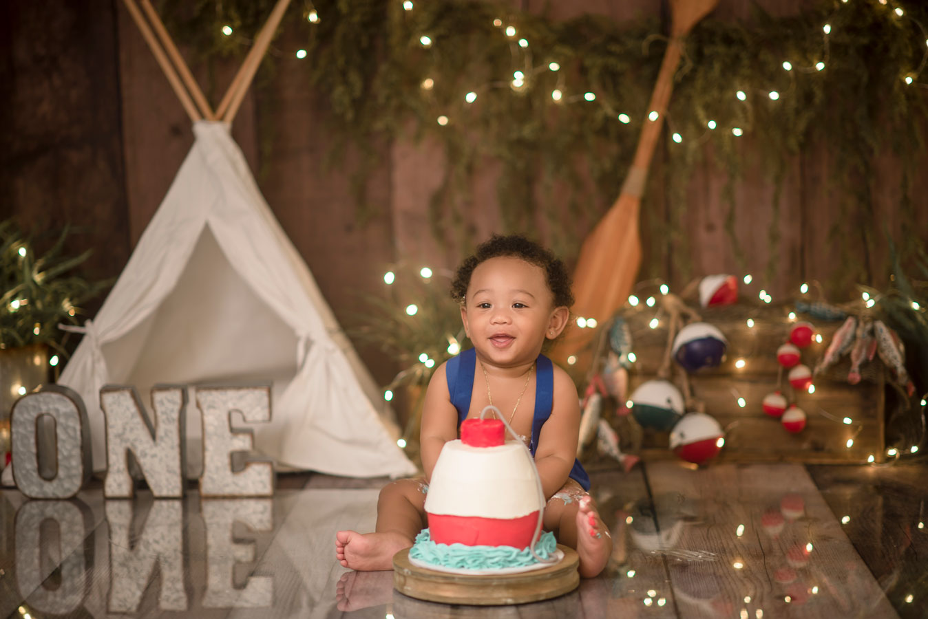 Gone fishing first birthday cake smash ofishally one boy cake smash ideas Roseville Rocklin Sacramento Folsom Elk Grove Eldorado hills cake smash photographer