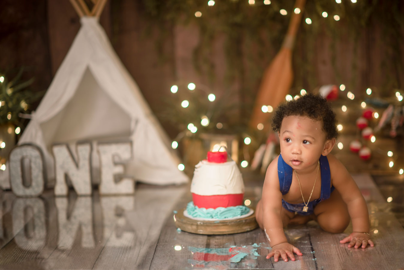 Gone fishing first birthday cake smash ofishally one boy cake smash ideas Roseville Rocklin Sacramento Folsom Elk Grove Eldorado hills cake smash photographer