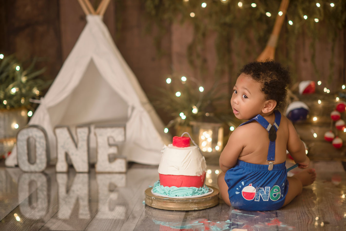 Gone fishing first birthday cake smash ofishally one boy cake smash ideas Roseville Rocklin Sacramento Folsom Elk Grove Eldorado hills cake smash photographer
